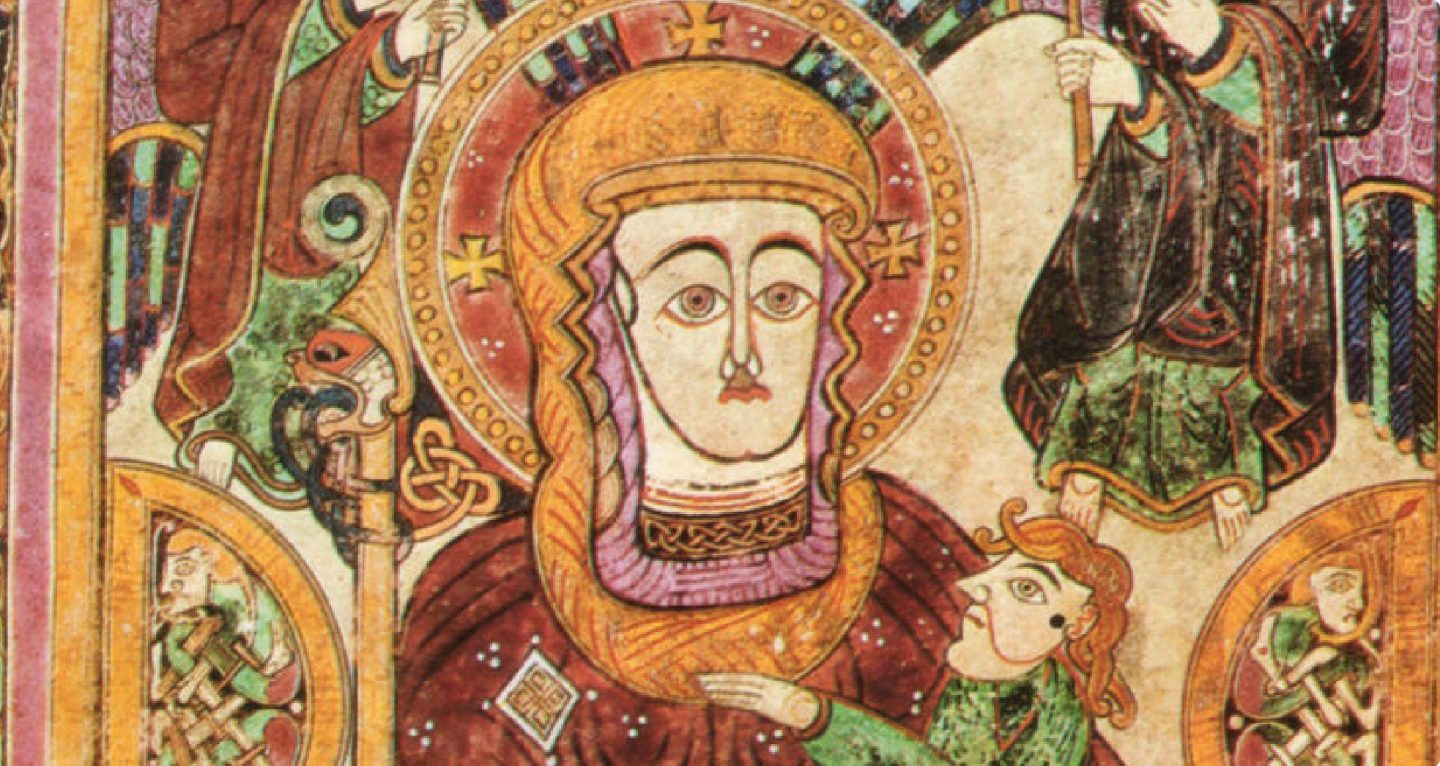 Close up of a face on the Book of Kells manuscript