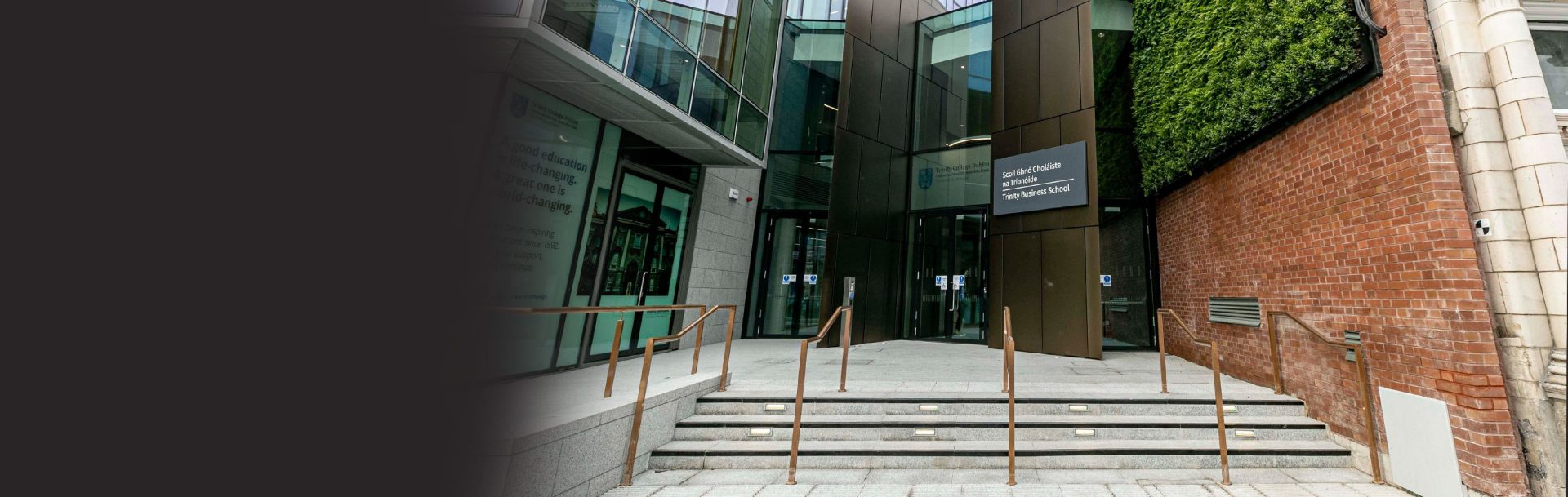 exterior of trinity business school with steps