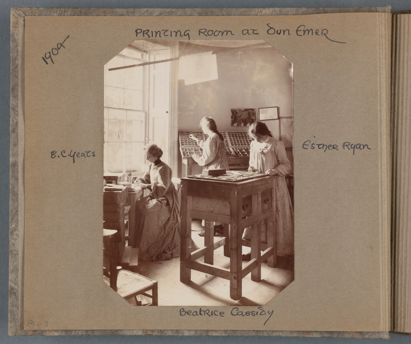 Black and white photograph of Elizabeth Yeats and assistants in a print room