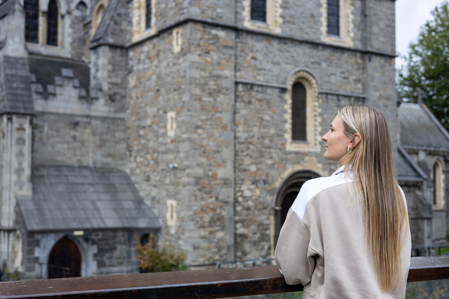 A woman looks out to Christ Church
