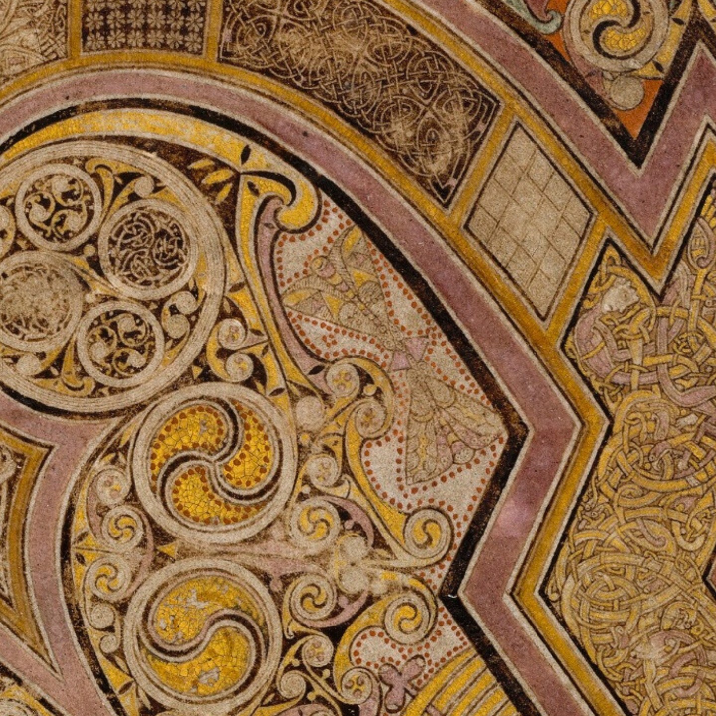 Image of two moths and butterflies in The Book of Kells: Chi Rho