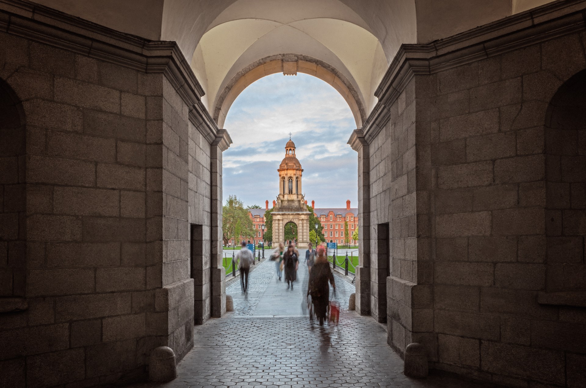 People walking through Trinity College Dublin